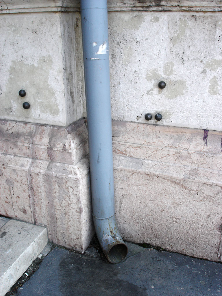 Marked bulletholes and pipe